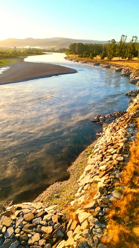 Leufü Valdivia, on the edge of the river and with a water hole