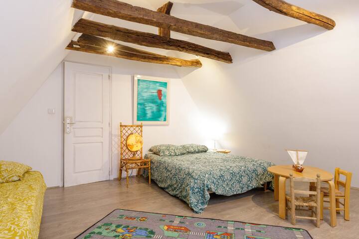 Dorm attached to the first with a double bed and 1 single bed.