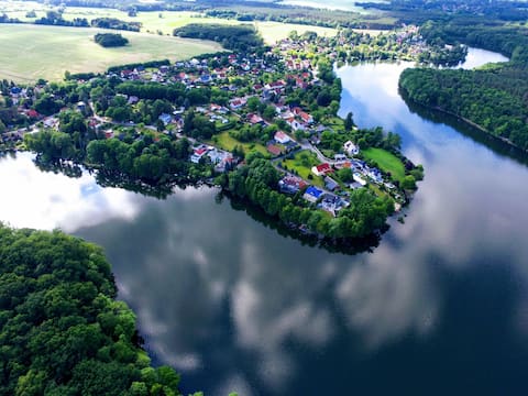 Apartment with lake view in former farmhouse