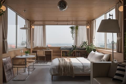 Downtown | Rooftop River Scene | Hidden Cabin