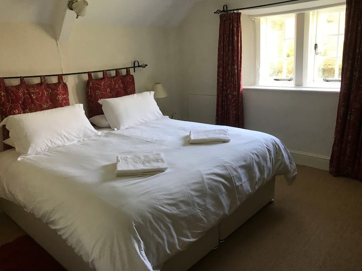 Master bedroom with zip and link bed, so can be used as 2 singles or a Superking bed with sea views