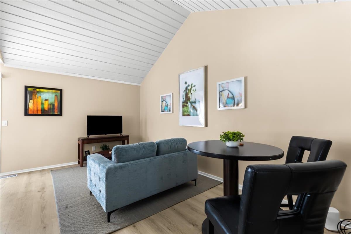 Vaulted living room in the New Hudson property