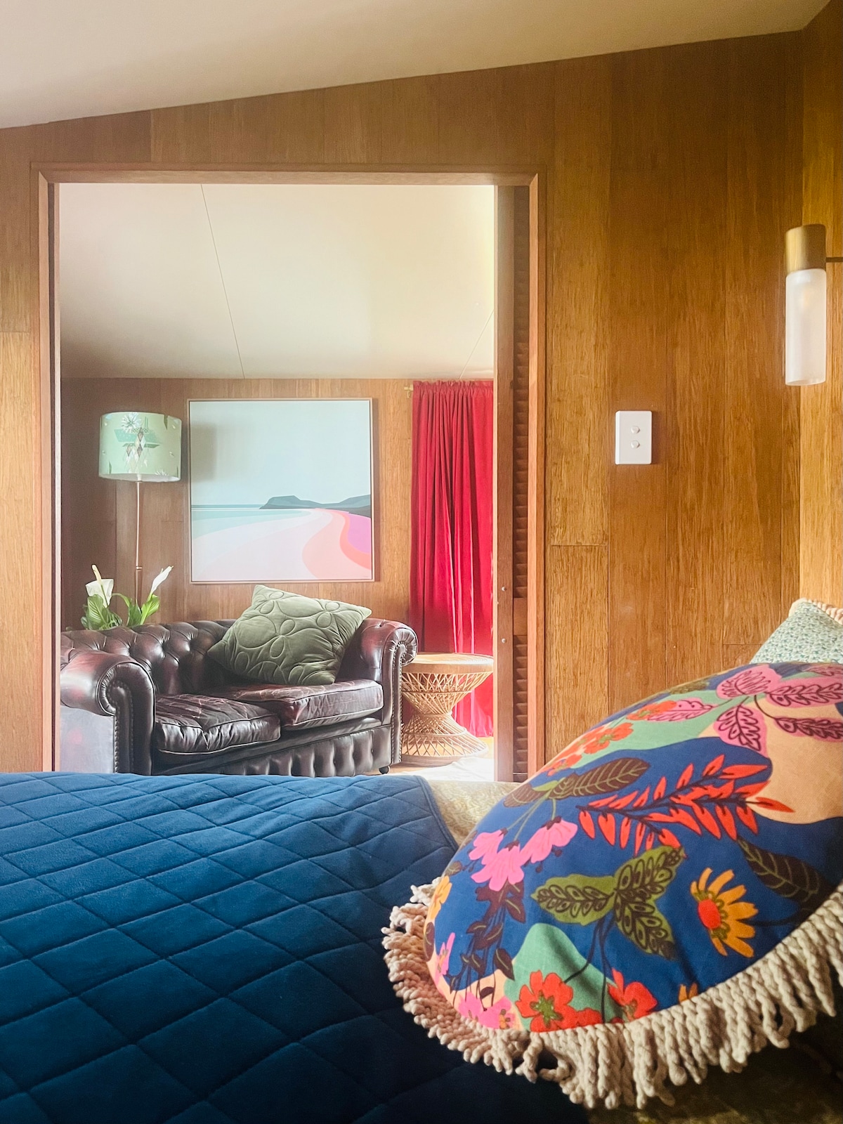 Comfortable and quiet bedroom with lush water and garden views.