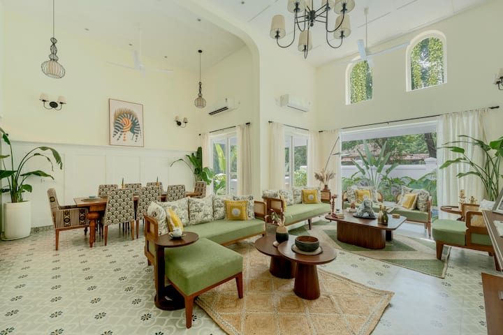 Spacious living area with plush seating and natural light