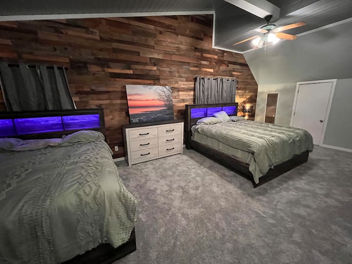 Master bedroom.  2nd floor.  Two king beds with accent lighting and dresser, night stands.