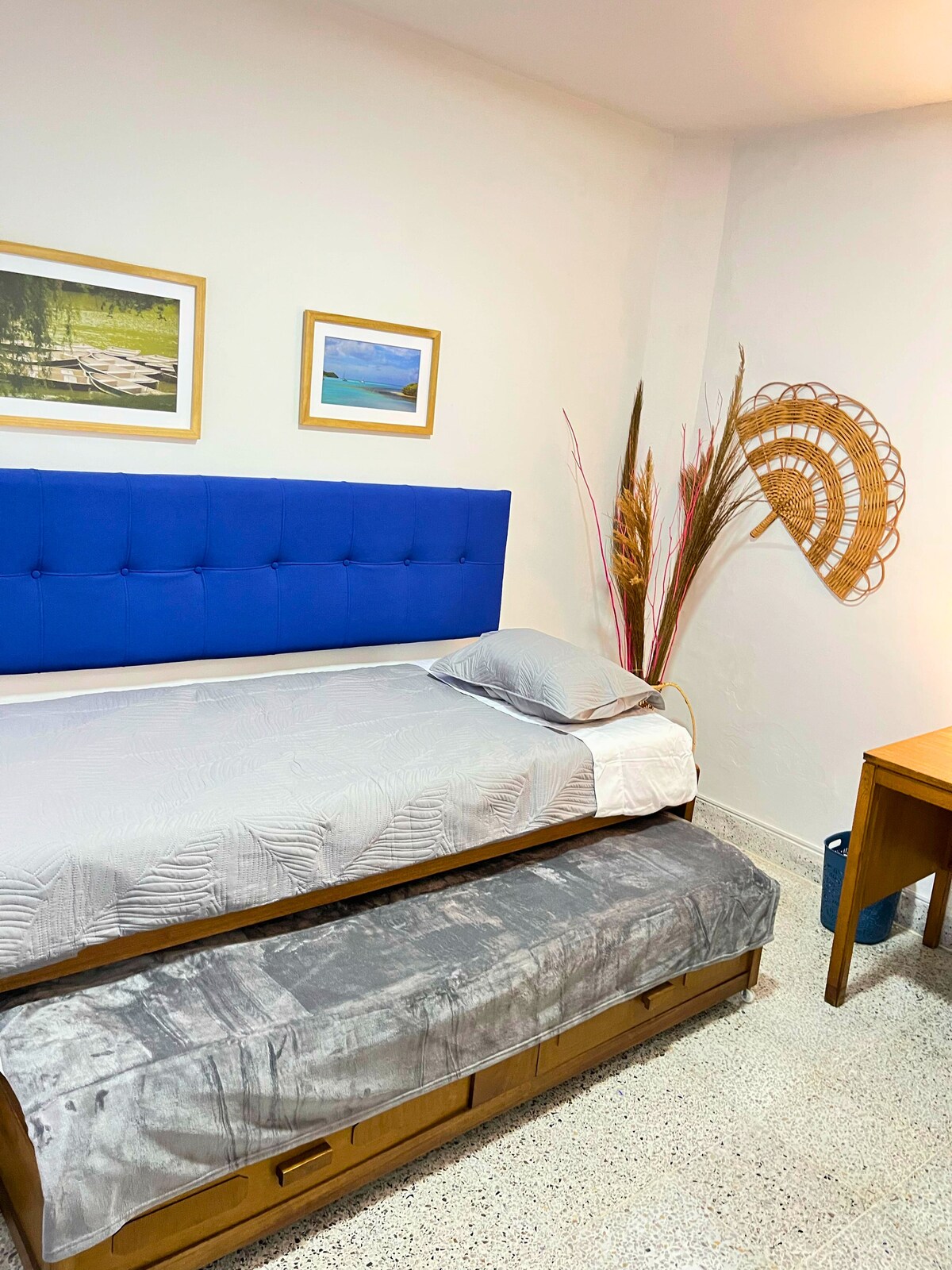 Comfortable 3rd room with 2 simple beds and work area!