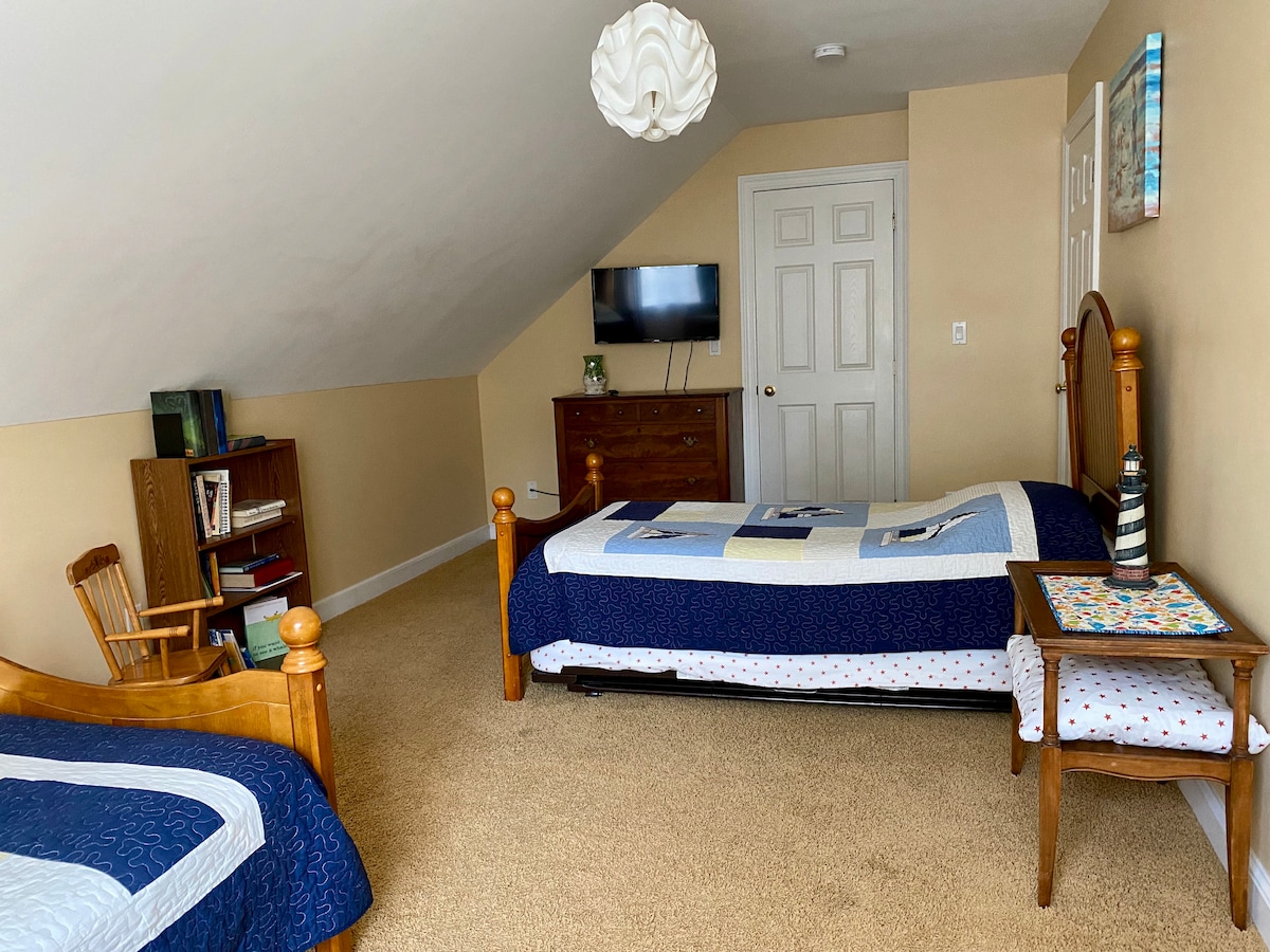 Bedroom #3 is on the 2nd floor and includes toys, games and books for all ages, a Smart HDTV and walk-in closet.