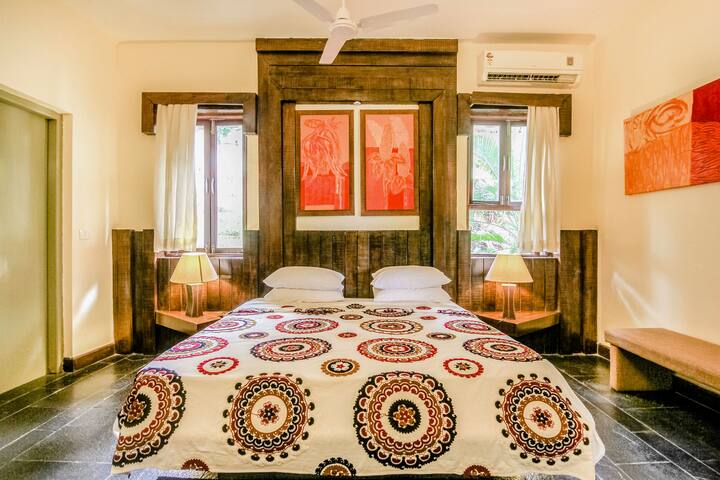 Experience comfort & charm in this Luxury Villa in Goa. This 7BHK bedroom boasts a cosy bed, vibrant décor, AC, and fan for a perfect night's sleep. Your ideal Goan getaway!