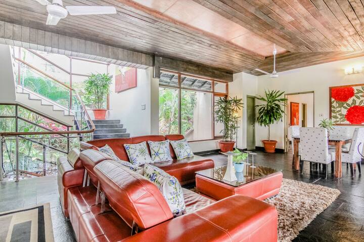 Indulge in comfort at this Luxury Villa in Goa. Featuring spacious living & dining areas with stylish décor, perfect for group gatherings. Your 7BHK Goan escape awaits!