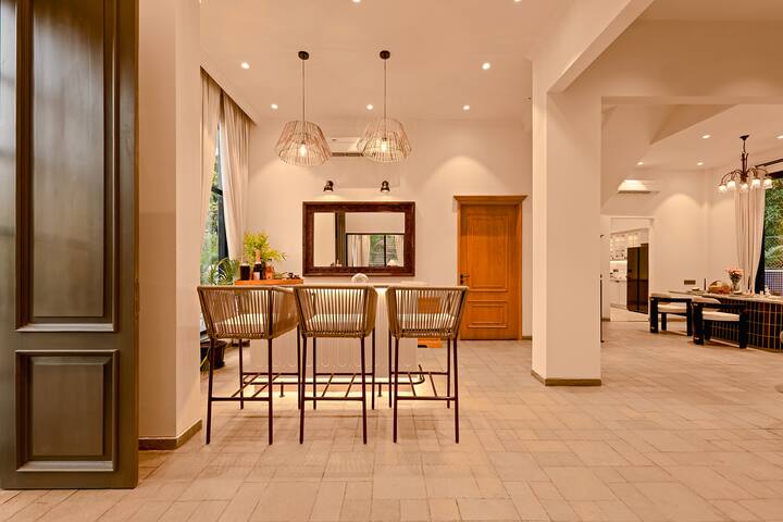 Relax at your private bar in this elegant Goa villa. Perfect for evening drinks and good company.