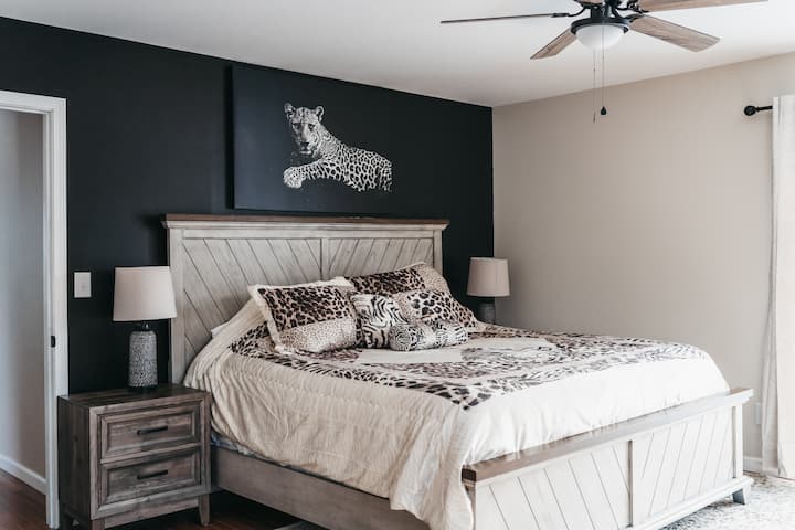 This bedroom blends modern rustic charm with fierce, untamed energy.