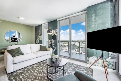 Popular Airbnb listing: Steps from Design District, City Views, Pool, Gym in Baypoint