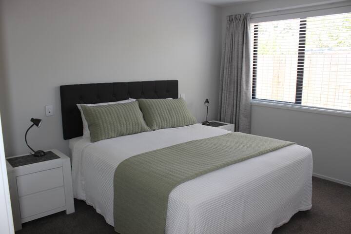 All the bedrooms are equipped with ultra-comfortable mattresses and pillows and phone charging points.
This master bedroom has an ensuite with shower and walk-in wardrobe.