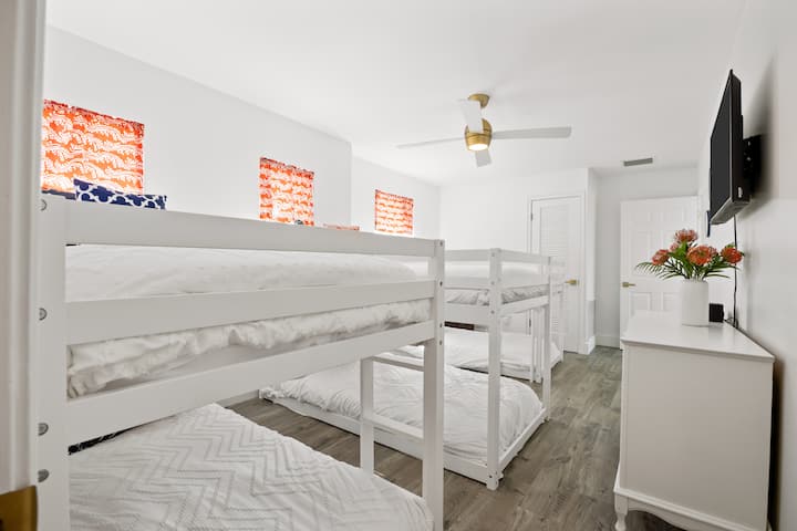 Bunk room - This bedroom is the second bedroom on the right-hand side when you reach the top of the steps on the second floor. This bedroom shares a full bathroom with the king bedroom next door. 