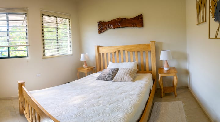 Enjoy a comfortable queen-size bed, locally crafted wood furniture, and unique handmade décor. Drift off into a deep, restful sleep in a calm and cozy atmosphere—perfect for ending the day feeling relaxed and refreshed.