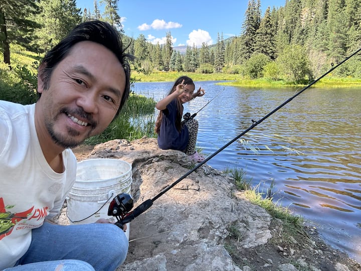 Dr. Duc Vuong and his daughter Maysen fishing together on the Pecos River