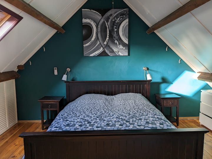 Large, luxury bedroom with adjustable bed and air conditioning (heating & cooling)