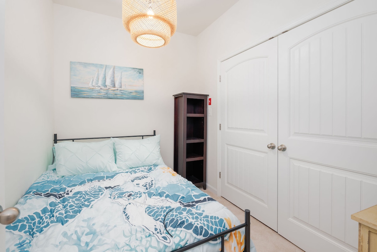 This isn't technically a bedroom per zoning, but clearly big enough to. Full sized bed, multiple dresser/furniture items, TV and fan so if need yet one more separate room for someone who snores or to spread out even more in larger parties we got you!