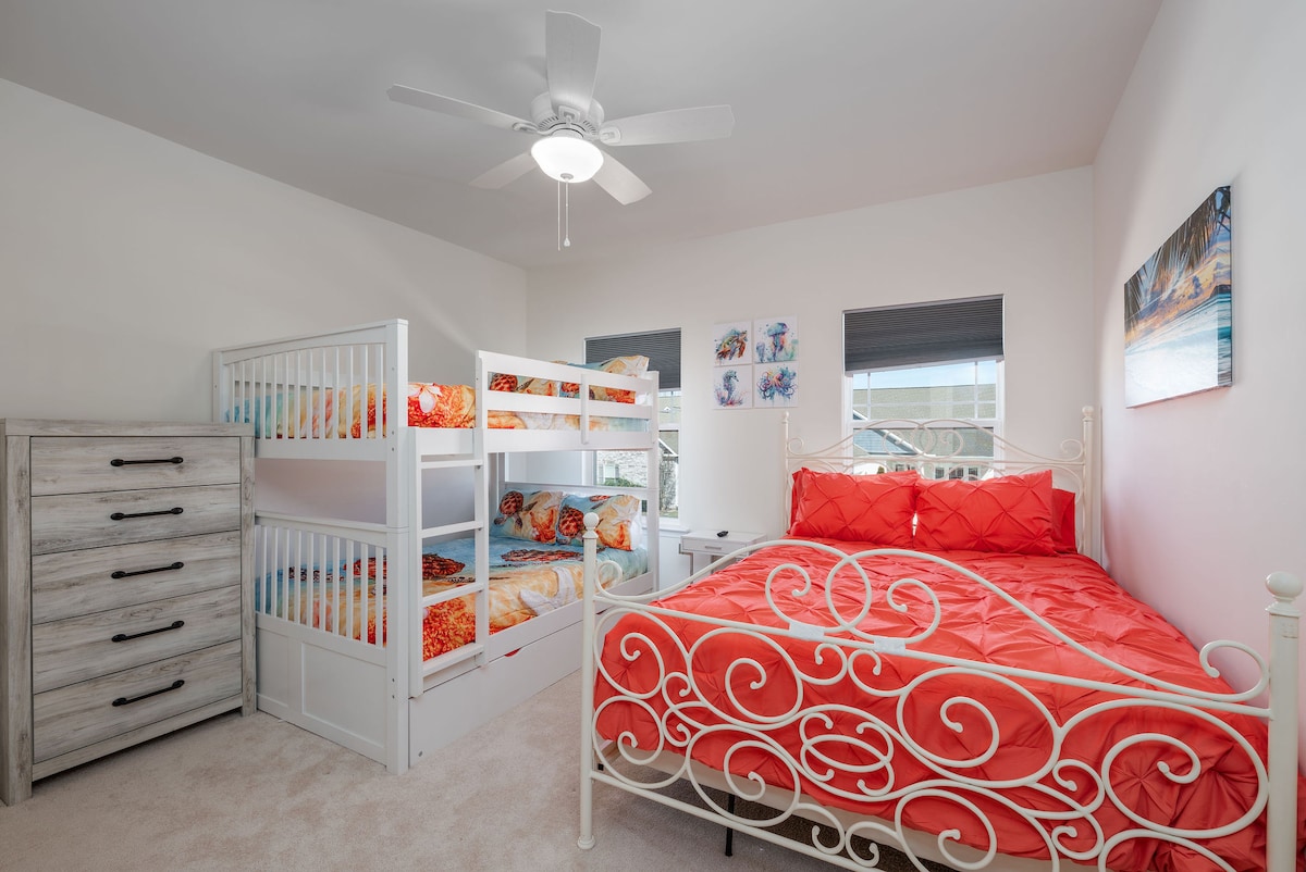 Enjoy one of our two extended family upstairs bedrooms equipped with a unique theme if you want girls in one room and boys in another. This one we have themed more for the ladies with queen bed, a full/full sized bunk bed with a twin trundle bed too!