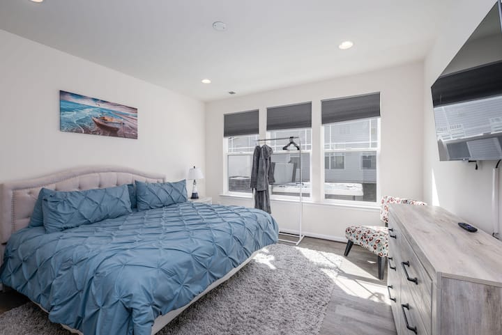 Enjoy this 1st of 2 master bedrooms. this is the downstairs one including hot tub robes.