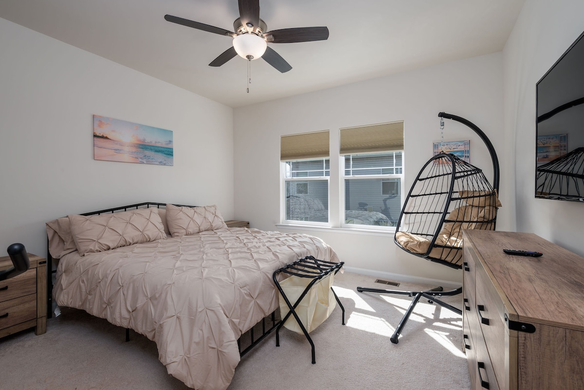 Enjoy this 2nd of 2 master bedrooms. this is the upstairs one. It also has a super cozy egg chair to read and relax!