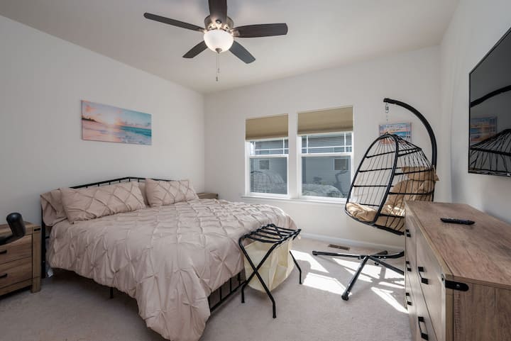 Enjoy this 2nd of 2 master bedrooms. this is the upstairs one. It also has a super cozy egg chair to read and relax!