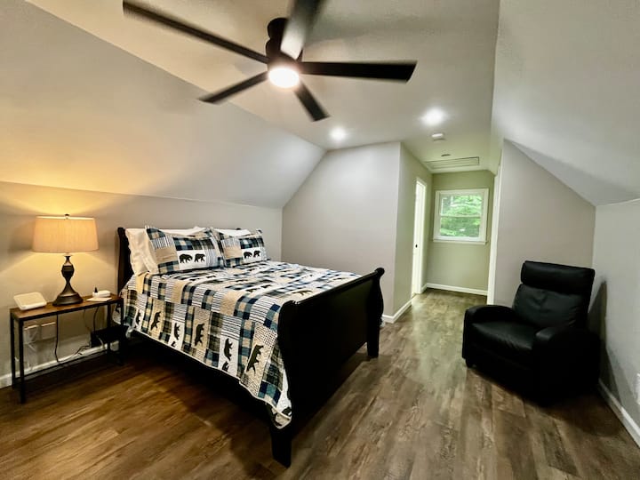 You'll find a double bed in the loft with a leather recliner. A large closet and private bathroom are located in the loft as well.