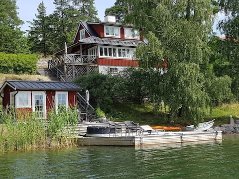House with pier, beach and sauna