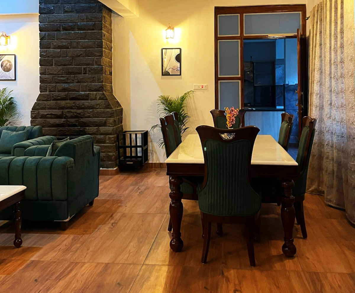 Dining area with fireplace — where evenings happen