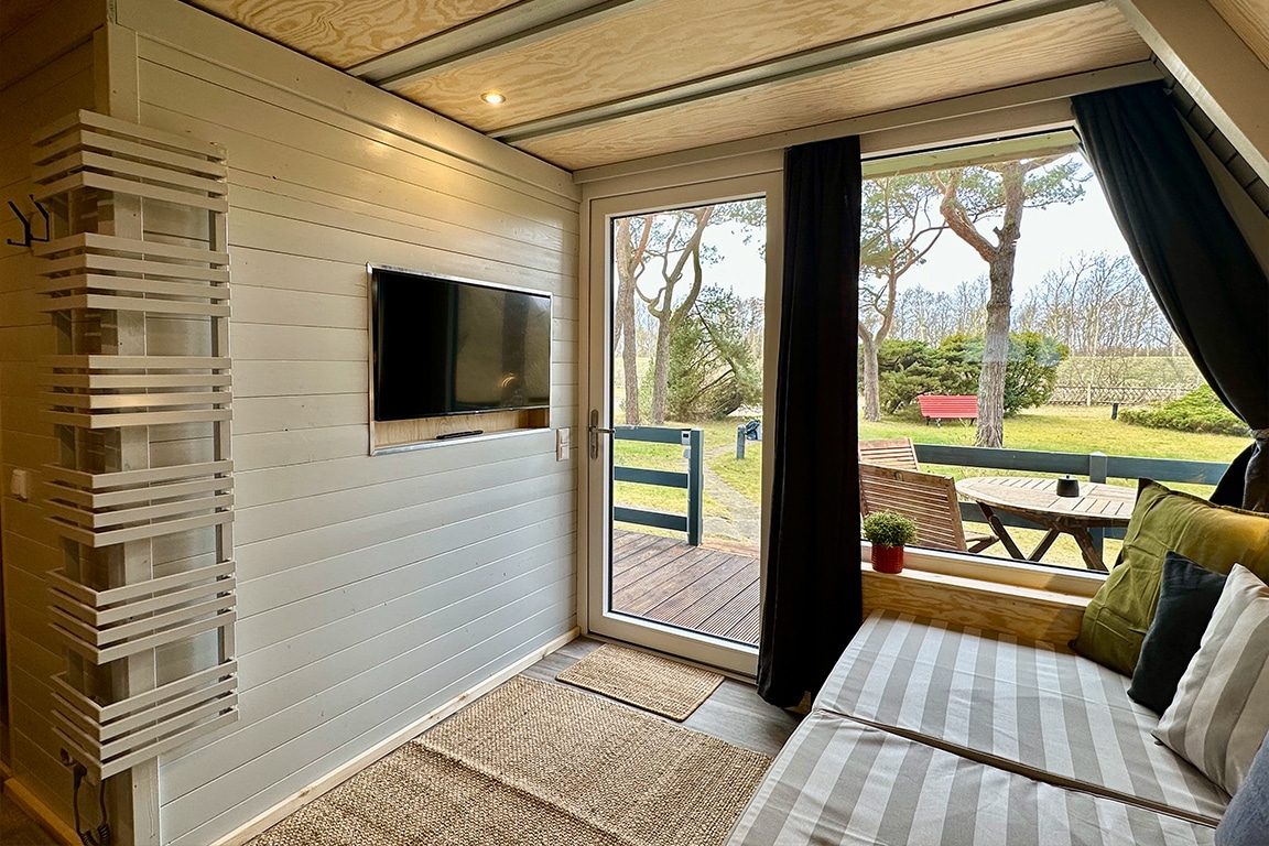 Popular Airbnb listing: Cozy Finnish hut with sauna on the beach - Hut 5 in Wustrow