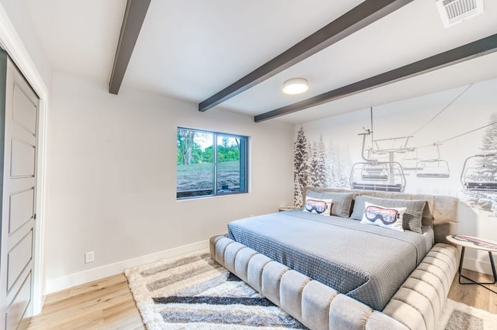 The Alpine suite offers a King bed with  blackout drapes and easy access to a full size bathroom.