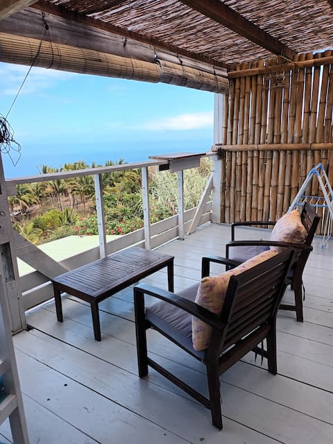 Popular Airbnb listing: independent accommodati kitchen on terrace, sunset in Saint Leu