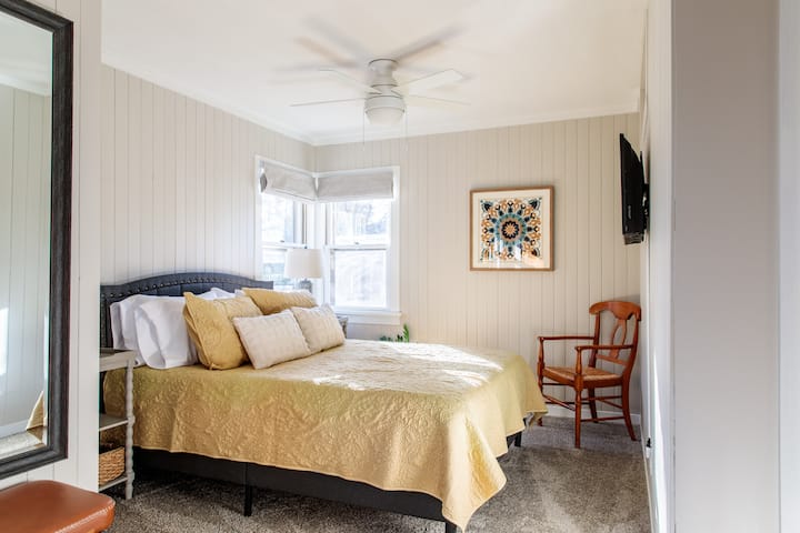 Bedroom 1 features a Queen bed, TV, closet and en suite bathroom.