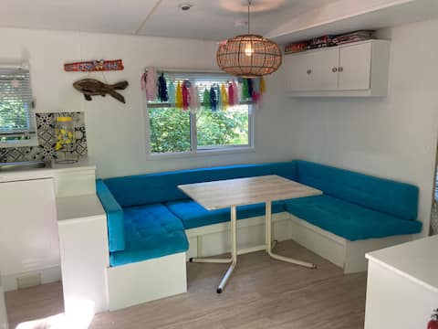Successful Airbnb property: Mobile home with large veranda at campsite Bakkum in Duin En Bosch