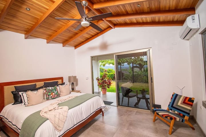 This Bedroom has its own sliding door separate entrance .King size Bed, ceiling fan, air condition unit, Full bathroom and private patio with outdoor furniture. 