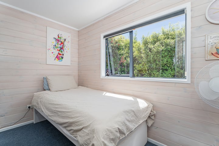 Upstairs.  King single bed
