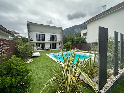 House at the foot of the mountains