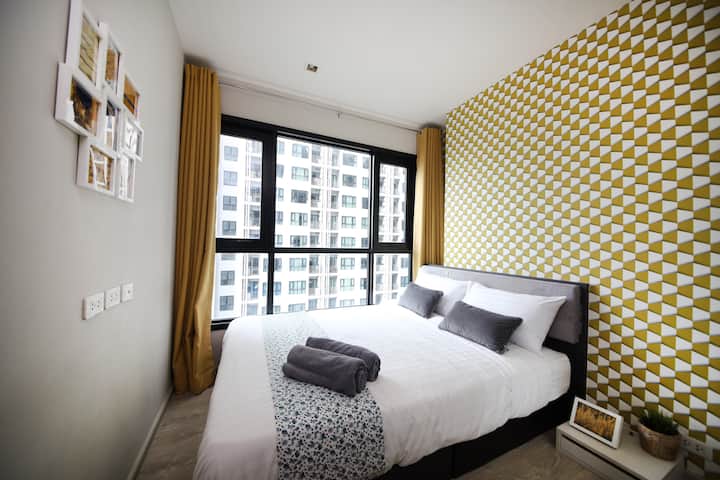 Queen size bed with internal pool view in 2nd bedroom