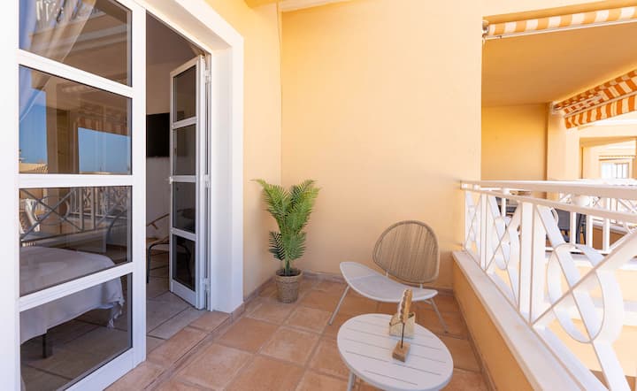 Apartment terrace with pool view