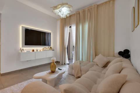 Top performing Airbnb: Elegant Poolside Escape |Designer 1BR|Balcony|Gym in Al Mamzar