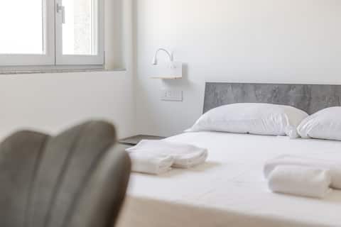 Bright room with private bathroom without kitchen