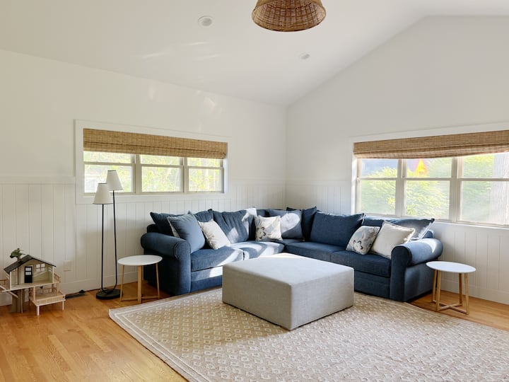 The perfect space for kids to retreat to; this family room has a 50” TV, toys, sofa bed, and pocket door to close off the space for privacy. It connects to a queen bedroom, making it the perfect suite for a family.