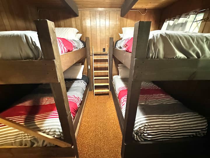 This 3rd bedroom with 2 sets of bunk beds gives you the true cabin experience! Please, no young children on top bunks.