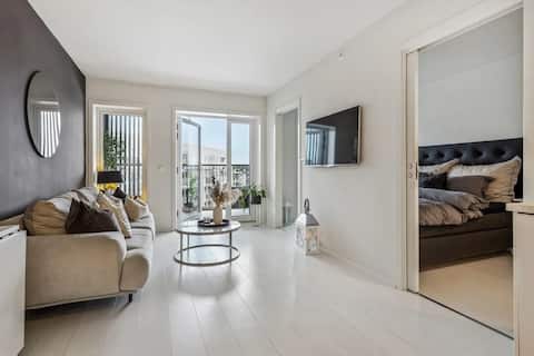 Successful Airbnb property: Bright and modern apartment near the airport in Ytrebygda
