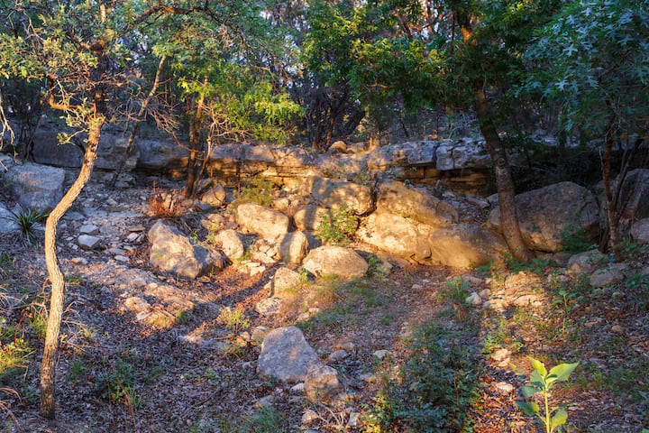 This is the peaceful natural grotto just beside the side patio of the log home. Gorgeous!