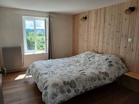 House with blue shutters in Marnand