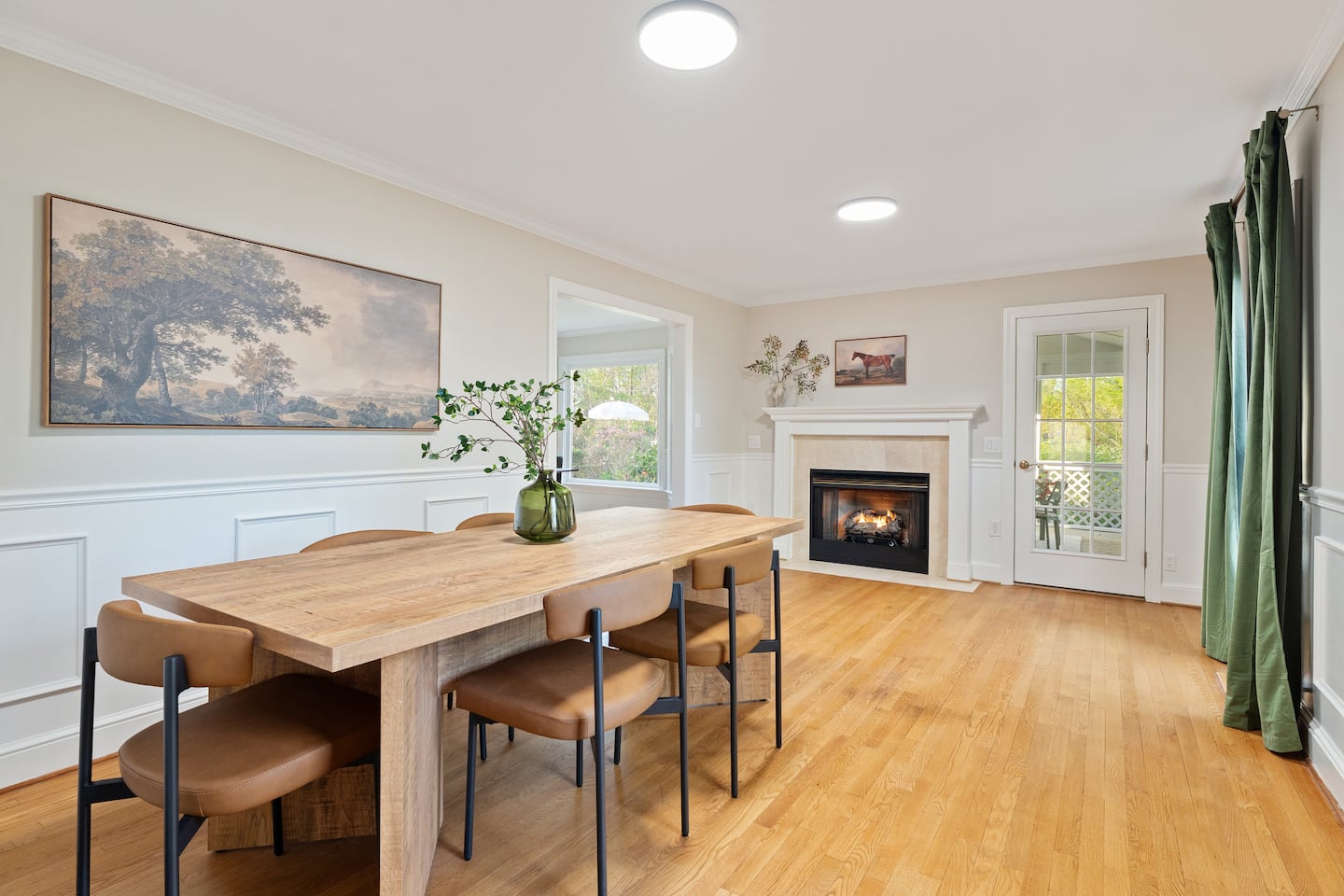 Photo 13 — Second dining table by the fireplace