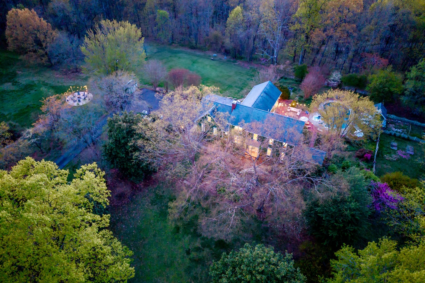 Photo 6 — Aerial view of the grounds and pool