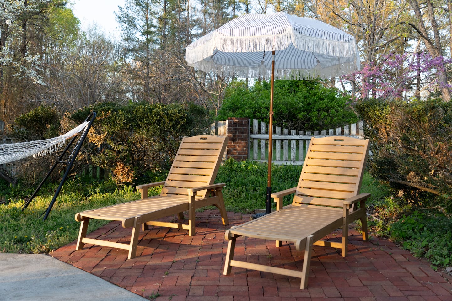 Lounge chairs and hammock in the yard