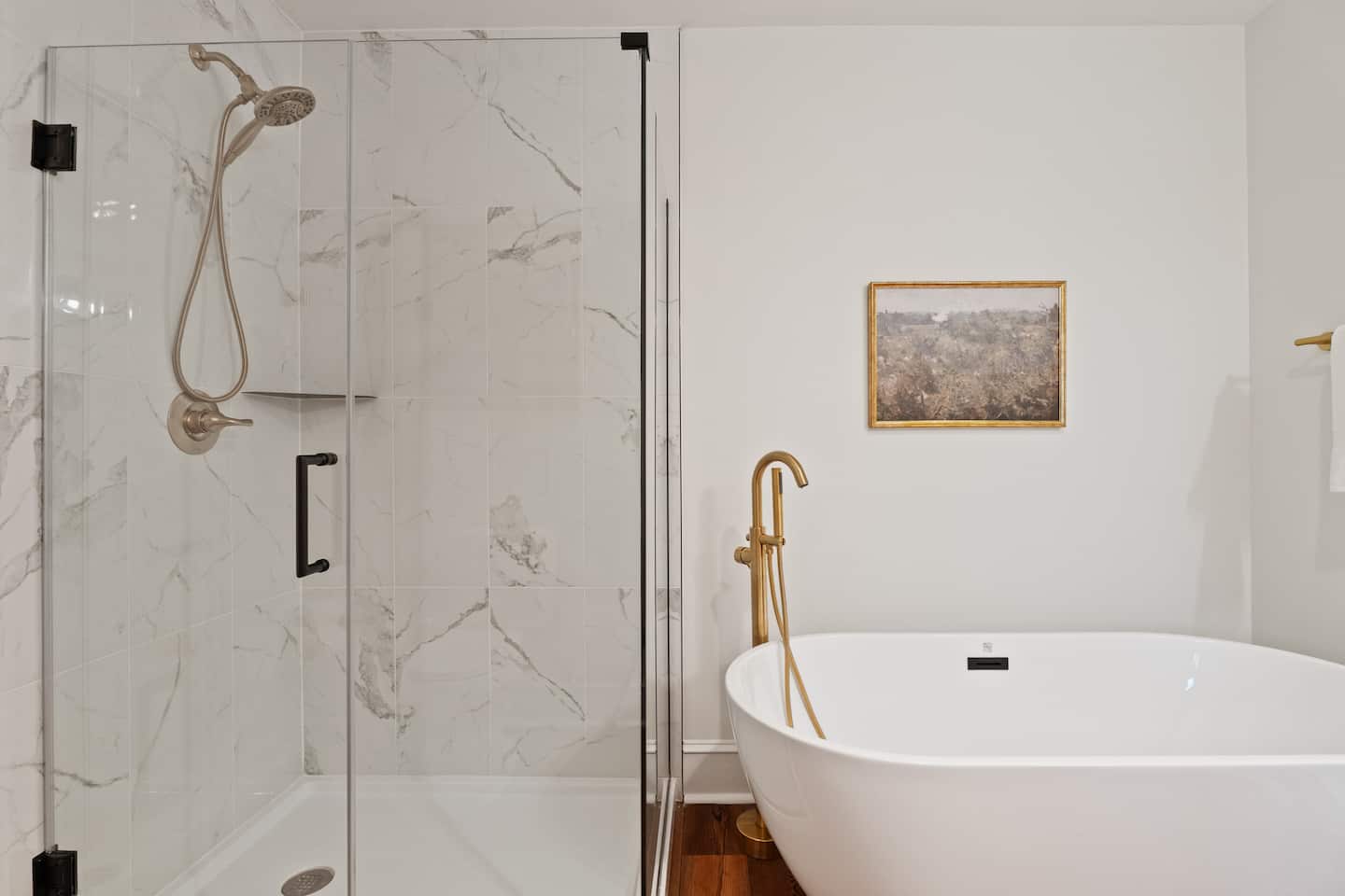 Photo 23 — Glass shower and freestanding soaking tub